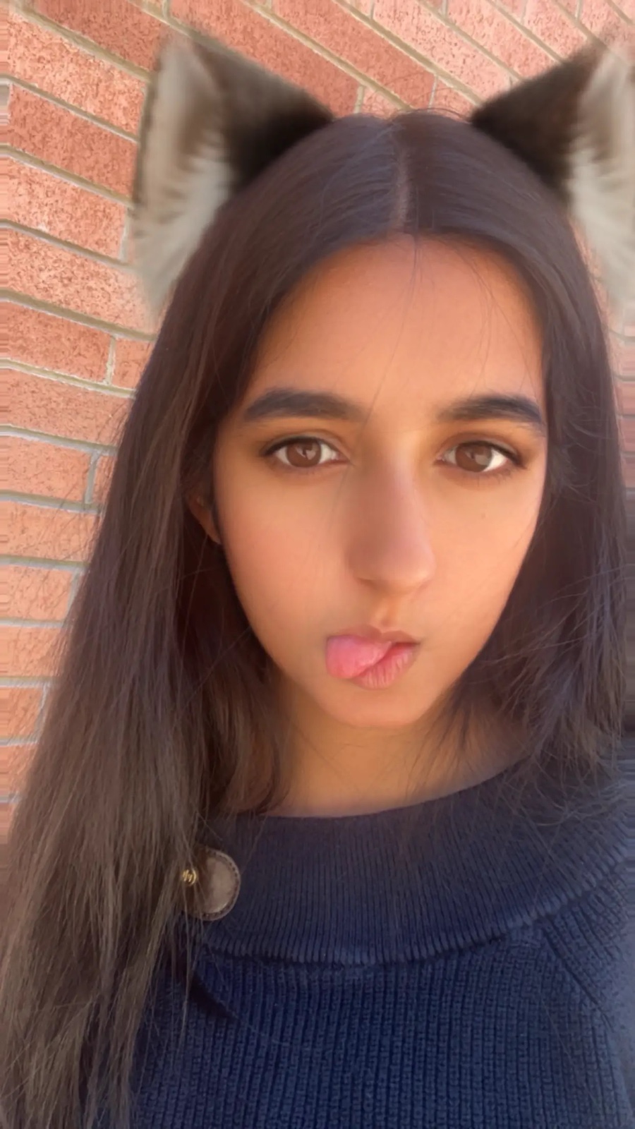 Sonali with a cat-ear filter